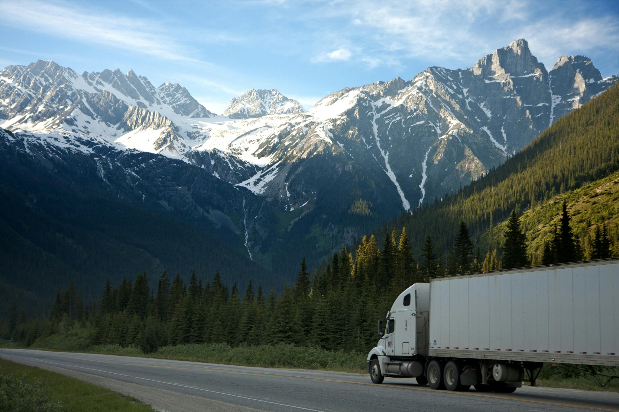 Truck driving with mountains